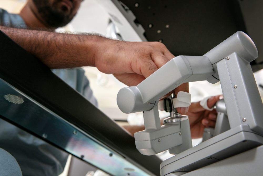 Dr. N. Santosh Reddy's hands using the da Vinci robot